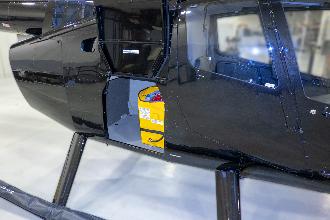 The R66 Slimline Fuel Tank holds 23.2 US Gallons of fuel. Robinson Helicopter Photo