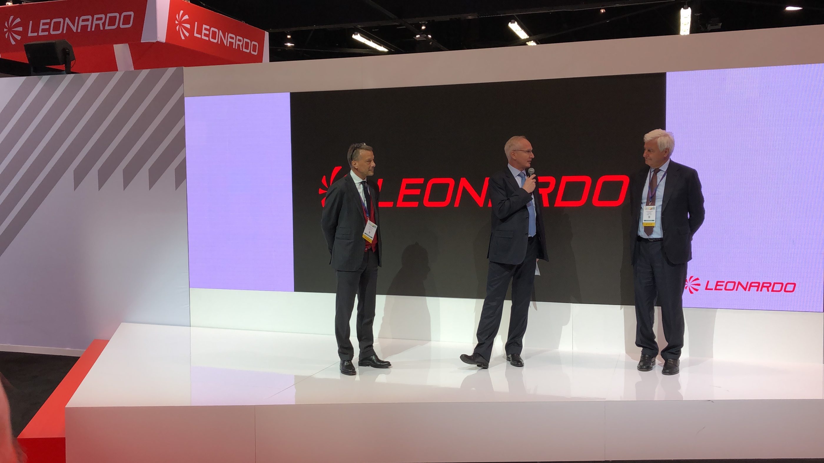 Kopter and Leonardo executives discussed the acquisition during a ceremony at HAI Heli-Expo 2020. From left: Leonardo Helicopters managing director Gian Piero Cutillo, Kopter CEO Andreas Löwenstein, and Leonardo CEO Alessandro Profumo. Oliver Johnson Photo