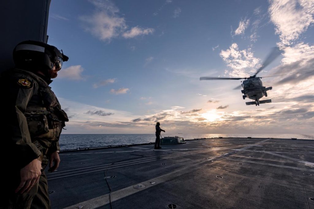 Australian and U.S. helicopter pilots reunited on the flight deck during the second phase of Exercise Malabar in the Indian Ocean.