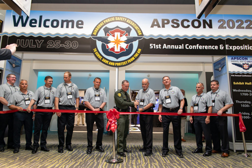 Washoe County Sheriff Darin Balaam is joined by members of the APSA board of directors in cutting the ribbon at APSCON 2022. Brent Bergan Photo