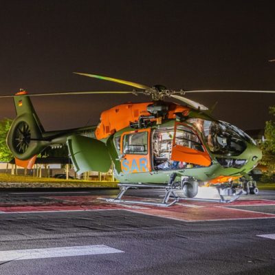 A Bundeswehr Airbus H145 LUH search-and-rescue aircraft rests at night. Photo submitted by Instagram user @aviation_jb
