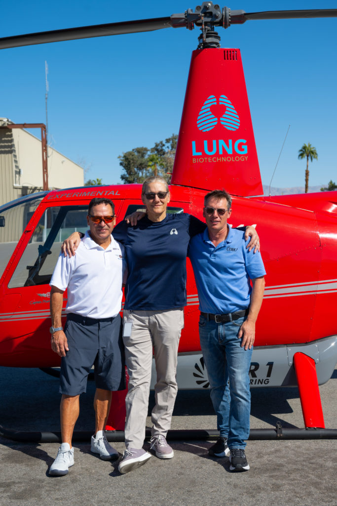 Ric Webb, Martine Rothblatt and Glen Dromgoole stand in front of the e-R44 after their arrival in Palm Springs. Dan Megna Photo