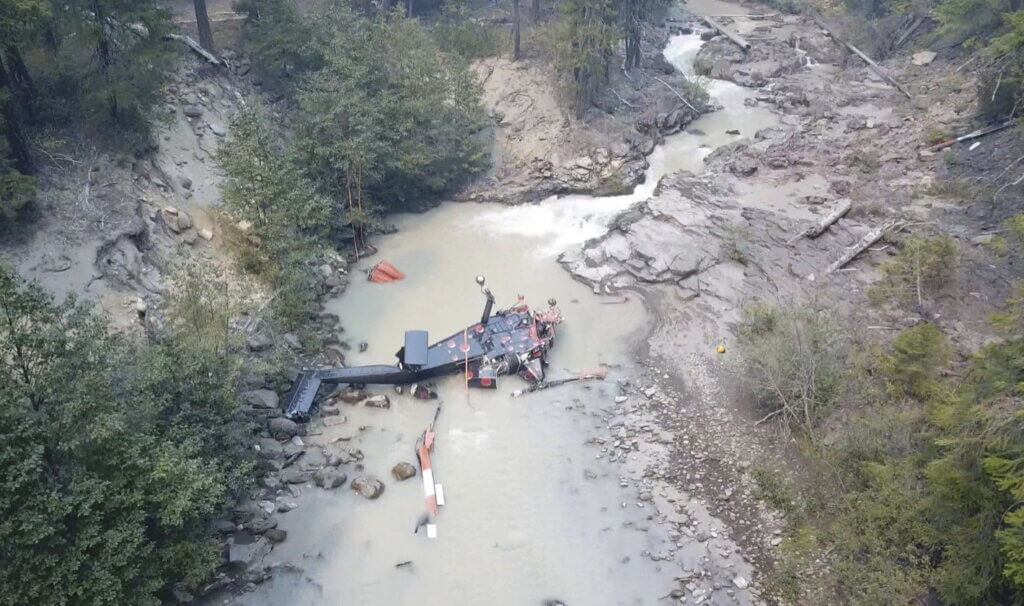 The Central Copters K-Max registered as N314 crashed while pilot Tom Duffy was filling a water bucket on a long line. The lack of damage to the long line demonstrated that both rotor systems and pylons had separated from the fuselage while the helicopter was in flight. Central Copters/NTSB Photo