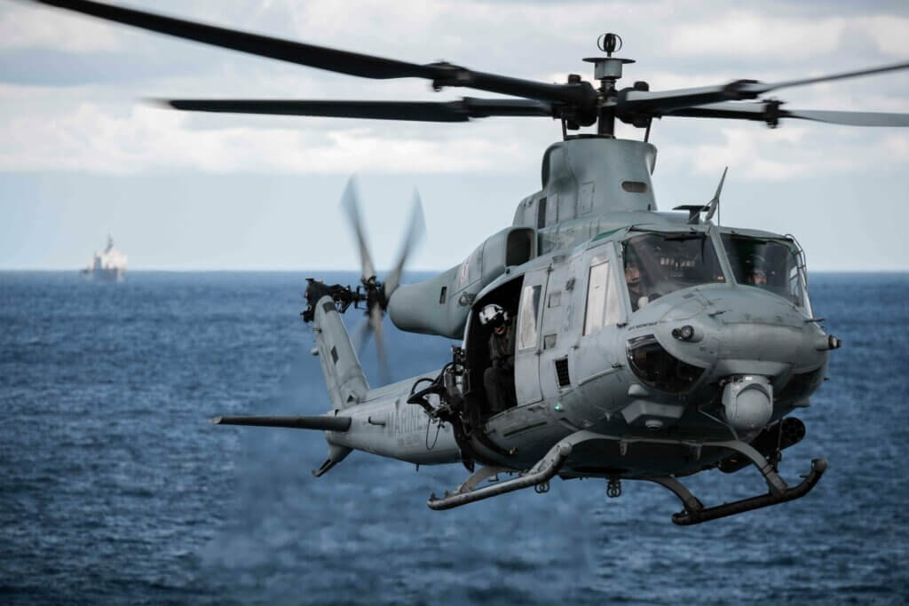 A U.S. Marine Corps UH-1Y Venom helicopter, attached to the 22nd Marine Expeditionary Unit (MEU), flies above the Baltic Sea during flight operations with the Wasp-class amphibious assault ship USS Kearsarge (LHD 3) Sept. 20, 2022. U.S. Navy/Mass Communication Specialist 2nd Class Jesse Schwab Photo