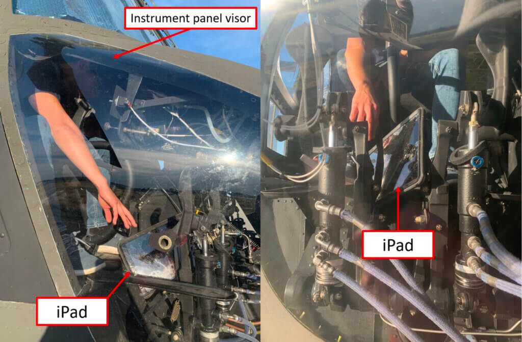 Investigators demonstrated how seat restraints and the instrument panel visor would have prevented the co-pilot from quickly retrieving the jammed iPad. NTSB Photo