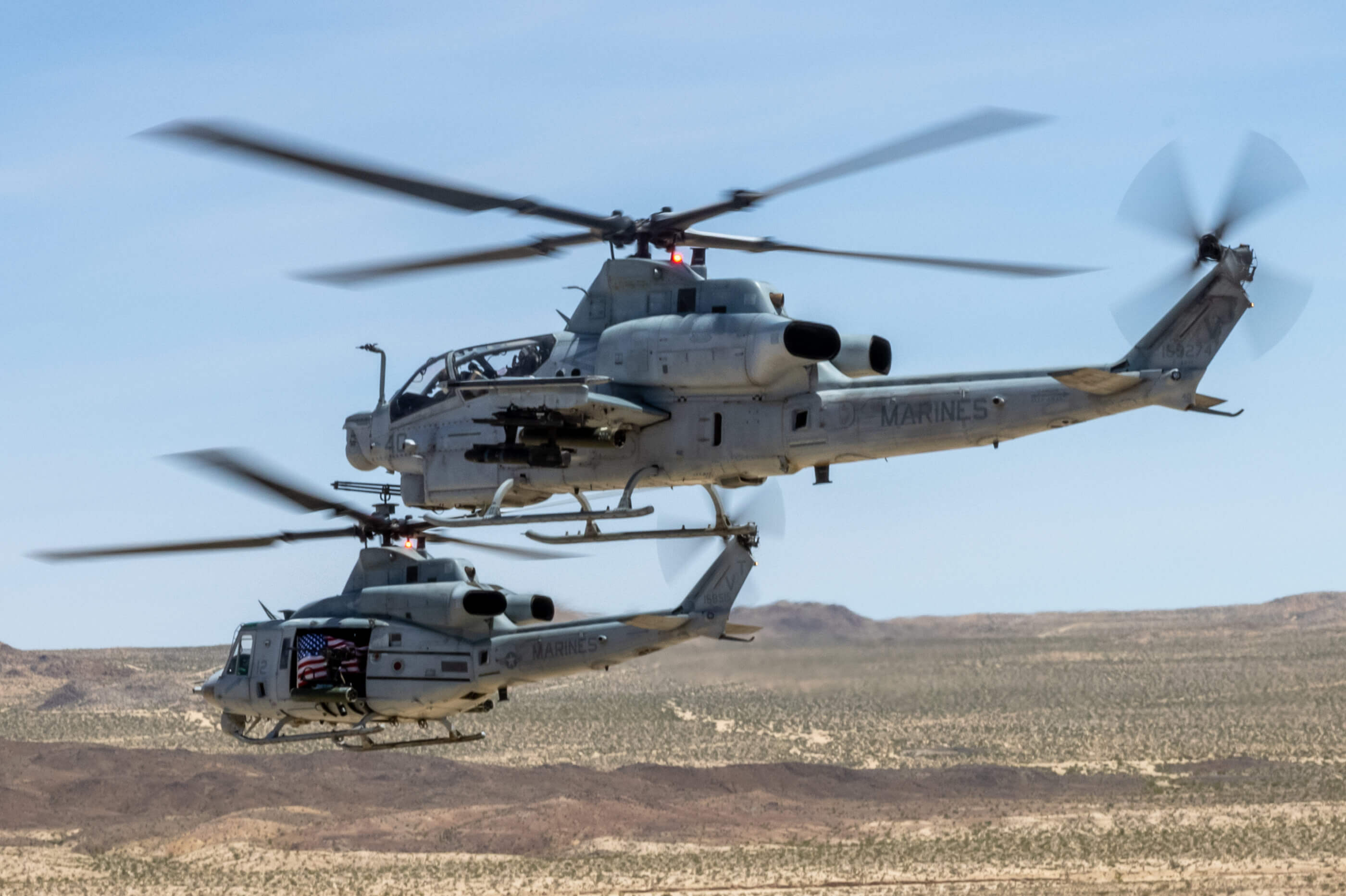 Bell AH-1Z Viper and Bell UH-1Y Venom provide air support during