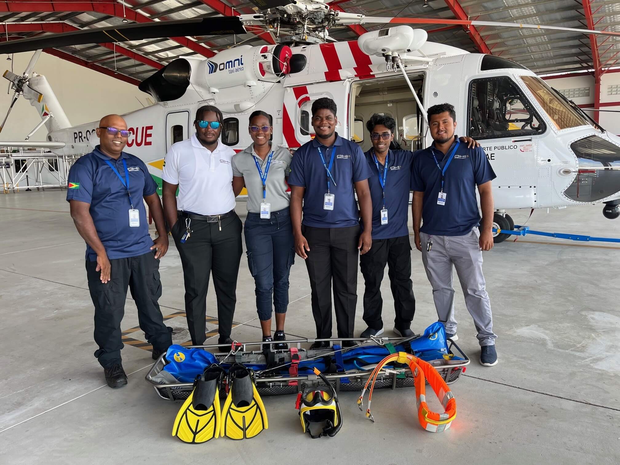 From left: Ishwar Parbhu, Daniel Yorris, Johnelle Ogle, Kevin Sawh, Somant Heeralall, and Curt Mendonca. Omni Helicopters Guyana Photo