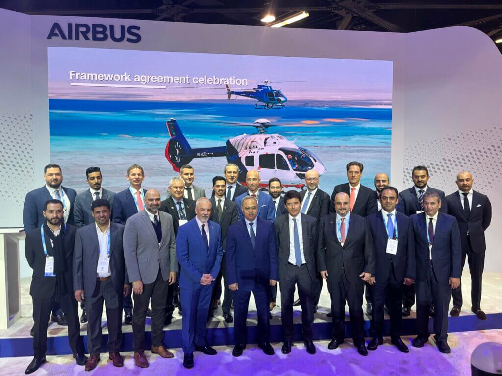 Airbus and THC executives celebrate the signing of the historic framework agreement. Oliver Johnson Photo