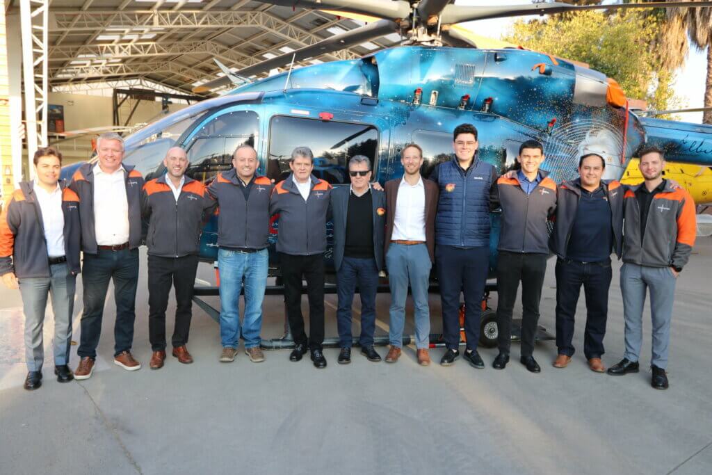 Executives from Helisul and Ecocopter stand in front of the Chilean operator's H145. Ecocopter Photo