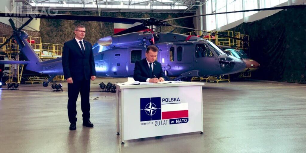 Former defence minister Mariusz Błaszczak pictured signing a contract for four S-70i Black Hawks at PZL Mielec in 2019. Polish Ministry of Defence Photo