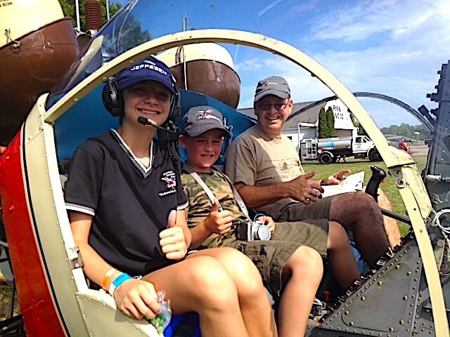 Chris Anderson flies some delighted young passengers. Chris Anderson Photo
